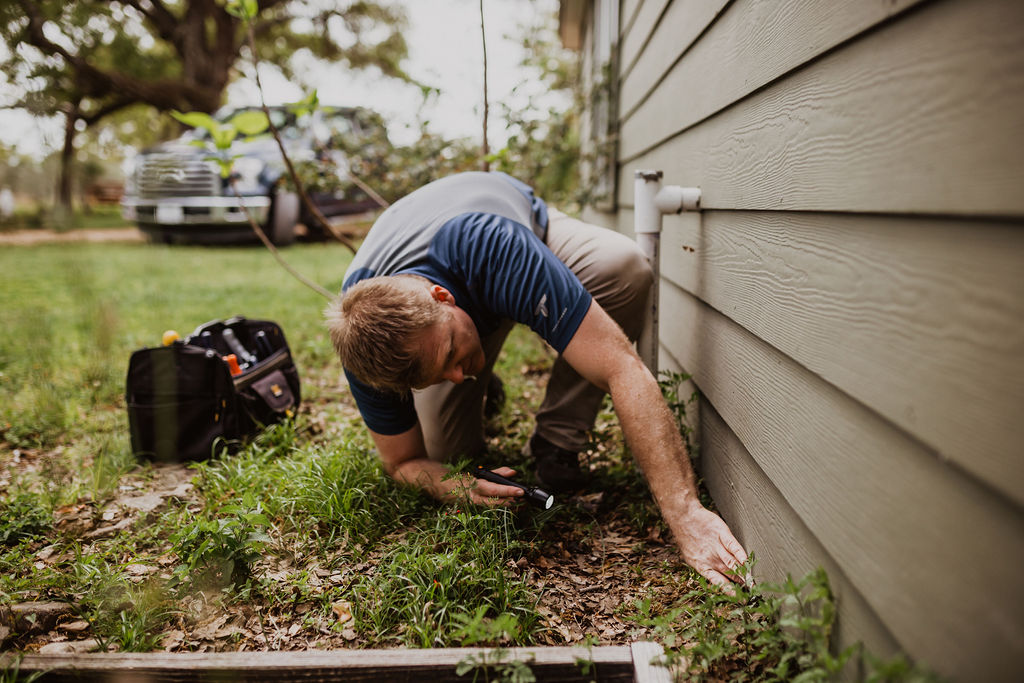 Jonathan Dooley conducting termite inspections