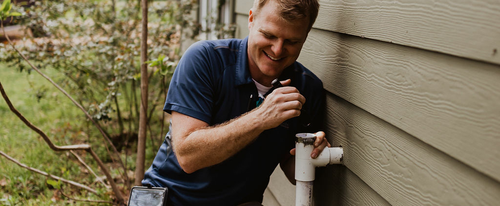 Jonathan Dooley Inspecting Water Line