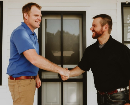 Jonathan Dooley Shaking Hands with Client