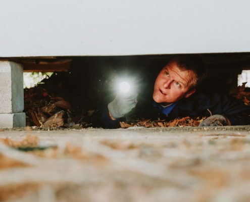 Jonathan performing a home inspection